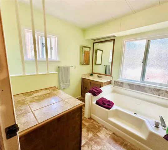 a bathroom with a sink and a bathtub