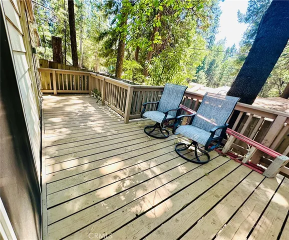 a view of roof deck with patio