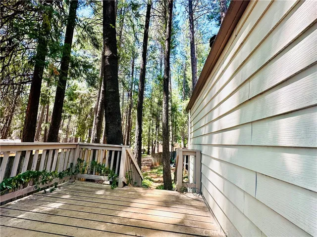 a view of deck with wooden floor and outdoor seating