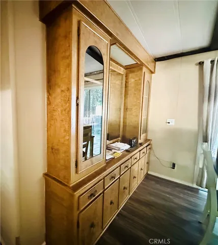 a bathroom with double vanity and a shower