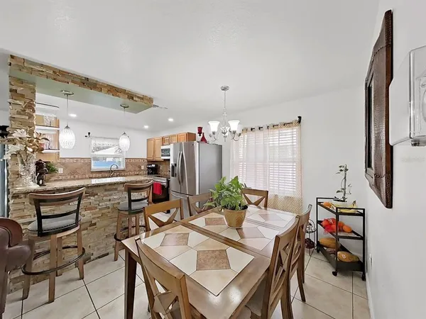 a view of a dining room with furniture