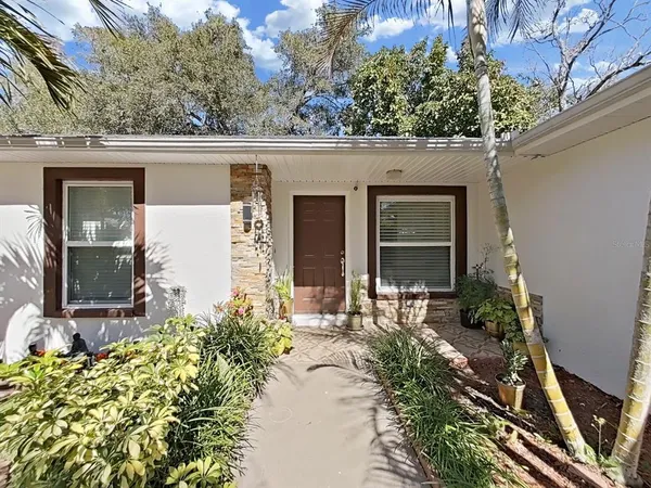 front view of a house with a small yard