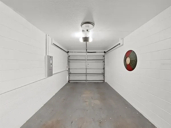a utility room with sink dryer and washer