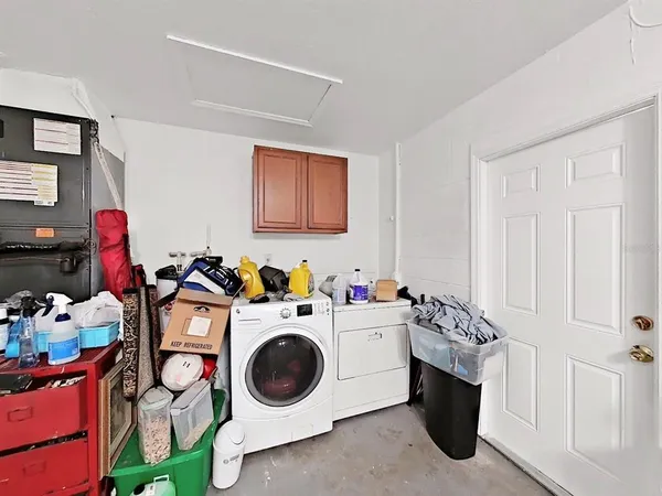 a view of a chairs and table in the patio