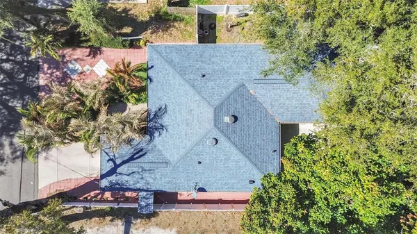 a view of a backyard with a patio