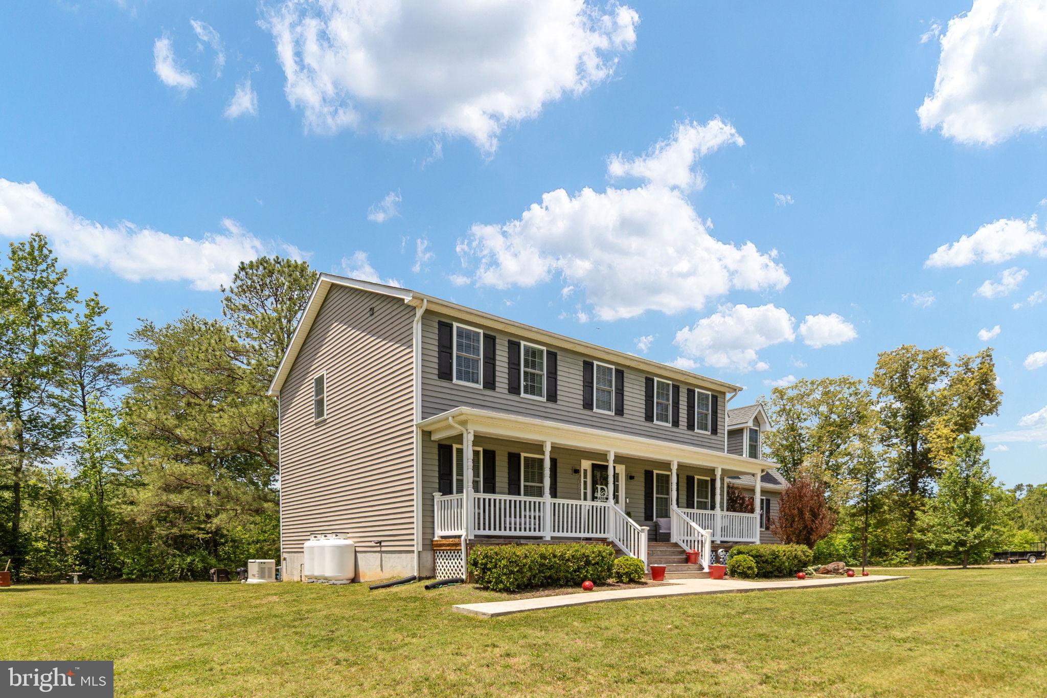 22088 Landora Bridge Road Ruther Glen, VA 22546 - Photo 11 of 122 Charming home with lush surroundings.