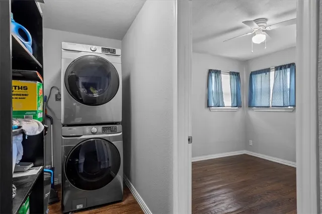 a view of a hallway with washer and dryer