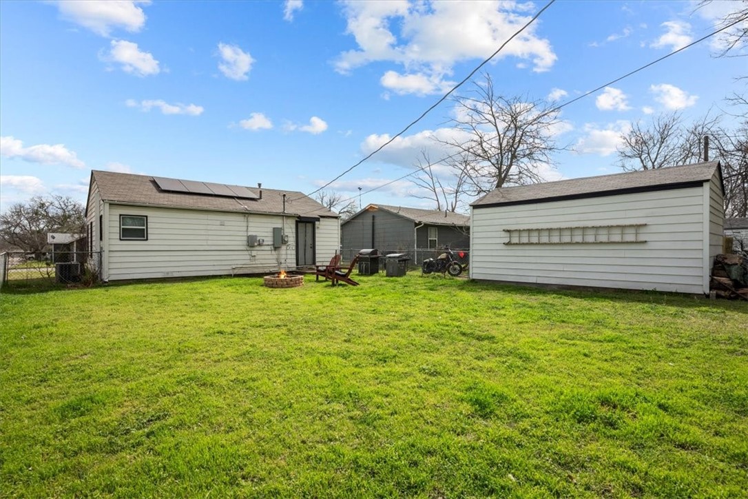 502 Bales Street Cleburne, TX 76033 - Photo 19 of 20 a view of a house with a garden