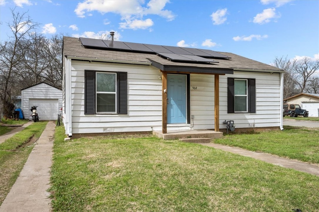 502 Bales Street Cleburne, TX 76033 - Photo 3 of 20 a view of a house with a yard