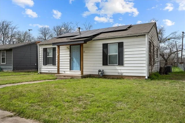 a house view with a garden space