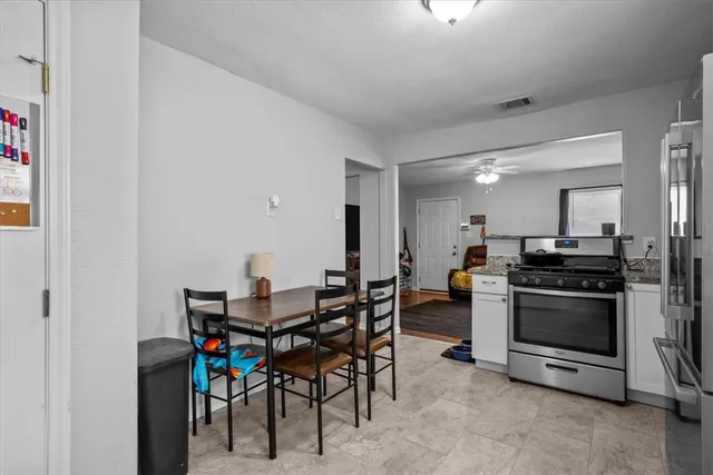 a view of a dining room with furniture