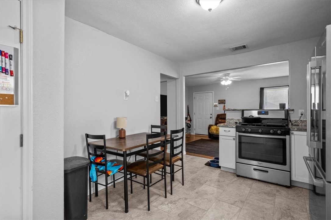 502 Bales Street Cleburne, TX 76033 - Photo 9 of 20 a view of a dining room with furniture