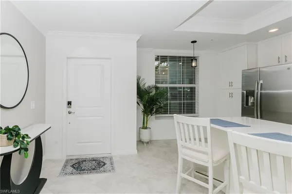a view of a livingroom with furniture and windows