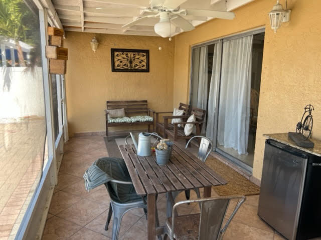 9957 Robins Nest Road Boca Raton, FL 33496 - Photo 14 of 22 Screened patio