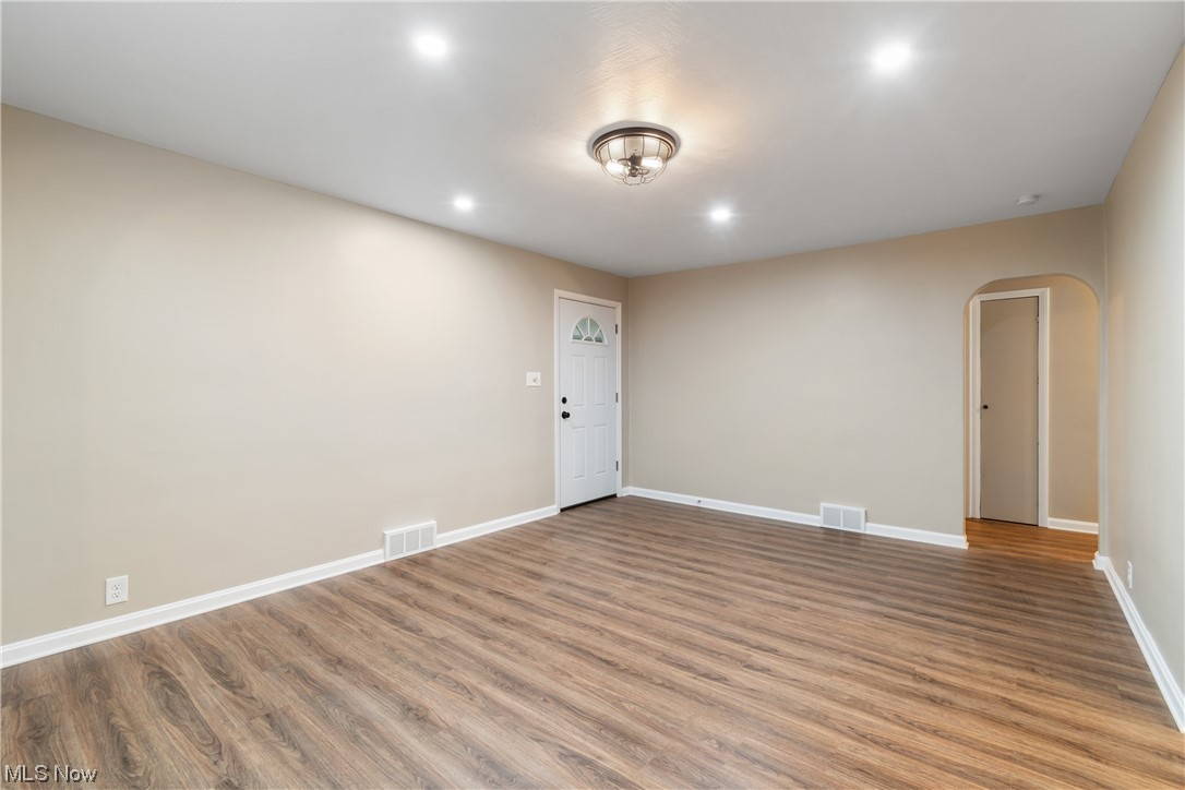 916 Renninger Road Akron, OH 44319 - Photo 15 of 31 Empty room featuring hardwood / wood-style flooring