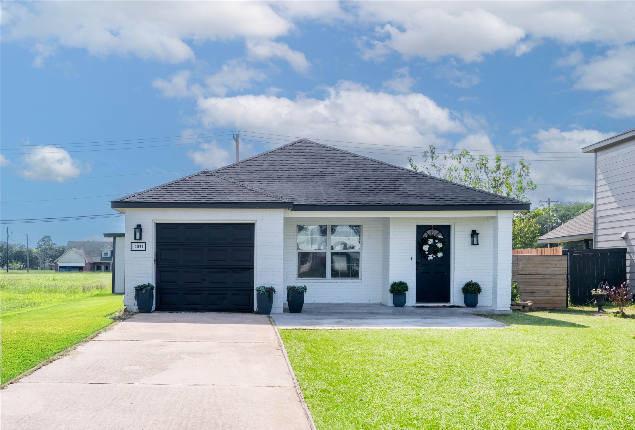 a house view with a garden space