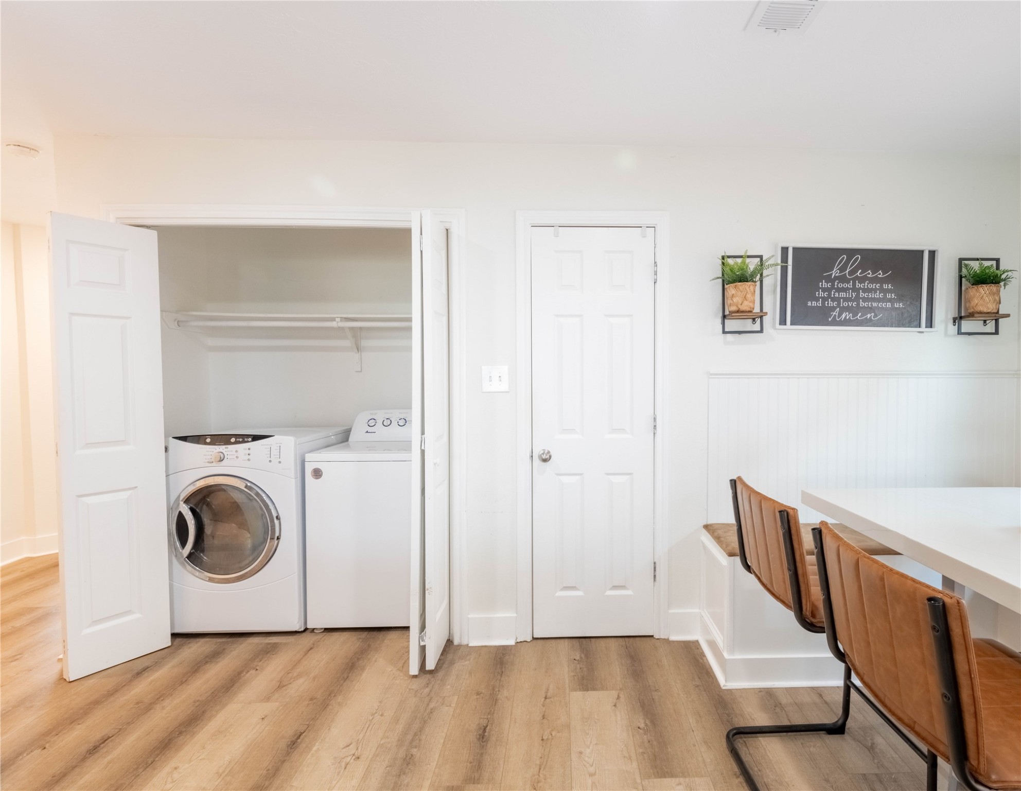 2031 7th Street Hempstead, TX 77445 - Photo 13 of 30 a view of a hallway with washer and dryer