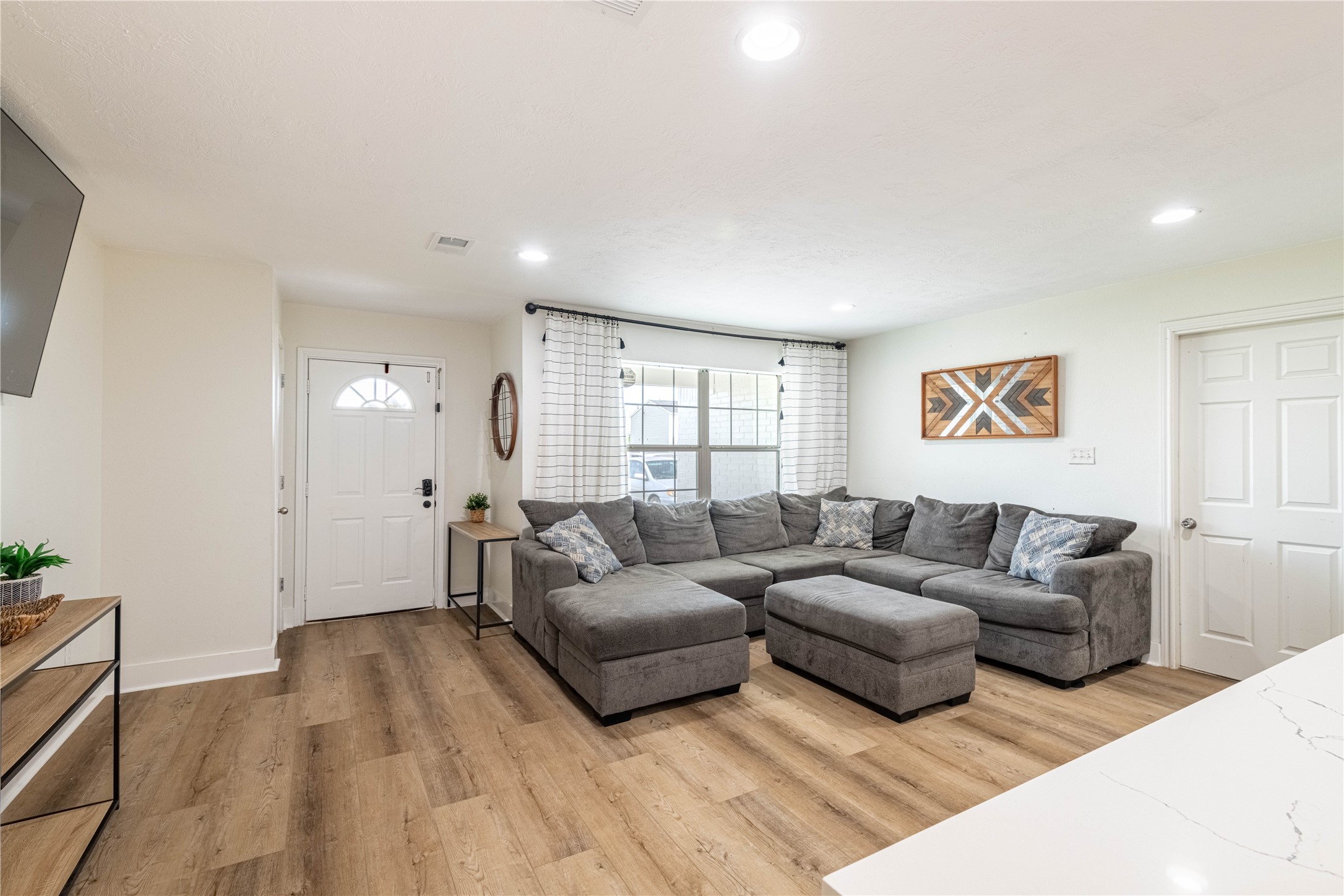 2031 7th Street Hempstead, TX 77445 - Photo 6 of 30 a living room with furniture and a window