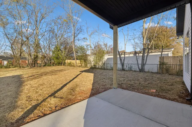a view of swimming pool with outdoor seating