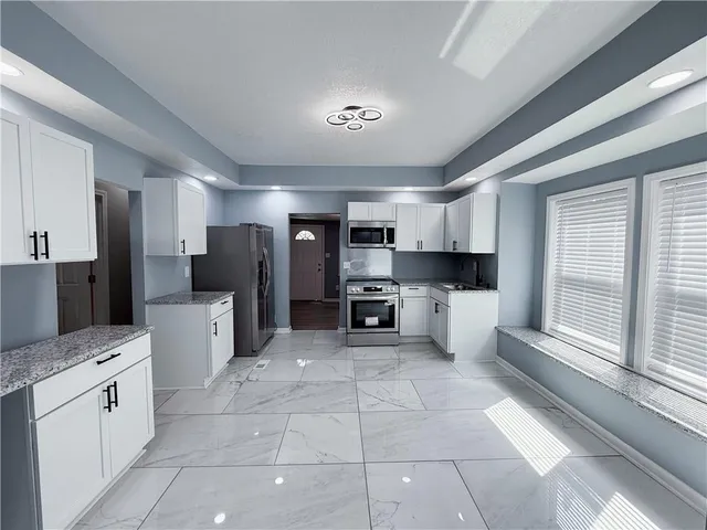 $295,000 | 4121 Woodland Avenue, Kansas City, MO 64110