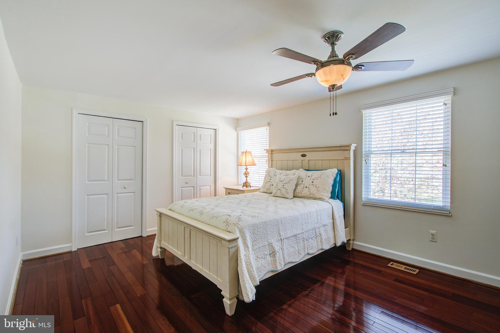 1413 Rainbow Drive Silver Spring, MD 20905 - Photo 23 of 50 a bedroom with a bed and a window
