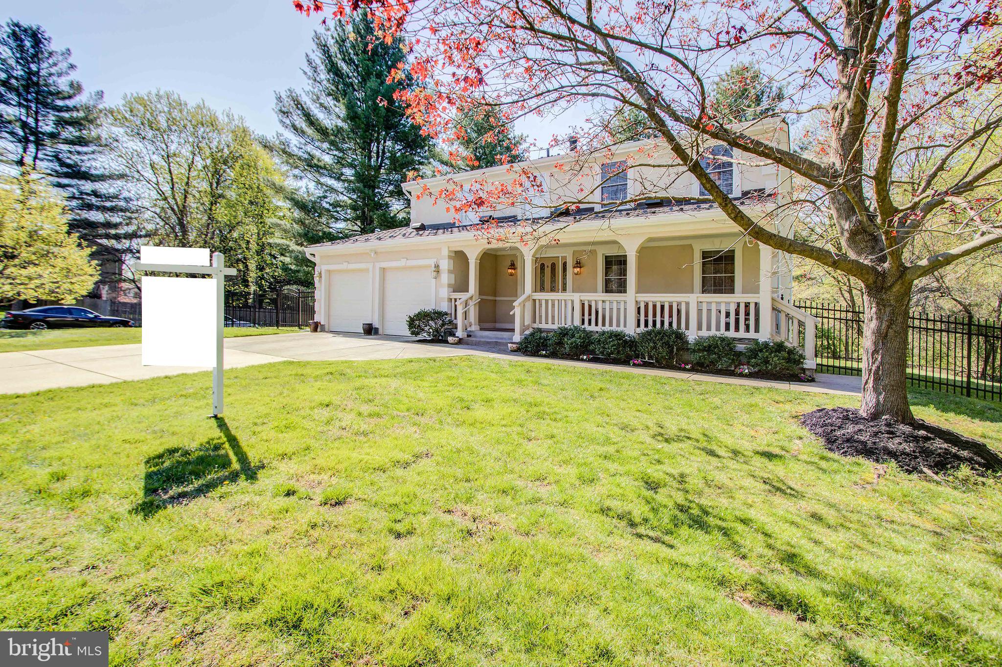 1413 Rainbow Drive Silver Spring, MD 20905 - Photo 4 of 50 a view of a house with a yard and tree s