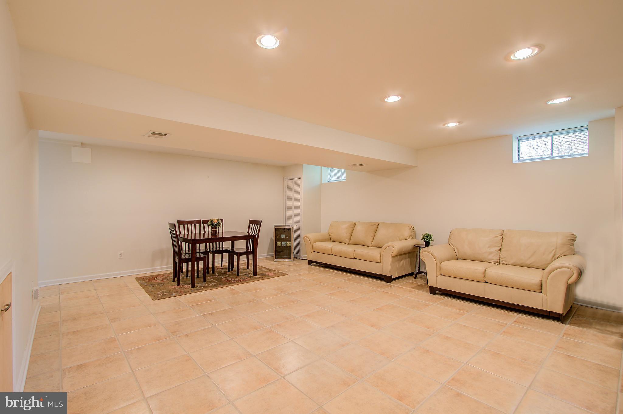 1413 Rainbow Drive Silver Spring, MD 20905 - Photo 36 of 50 a living room with furniture