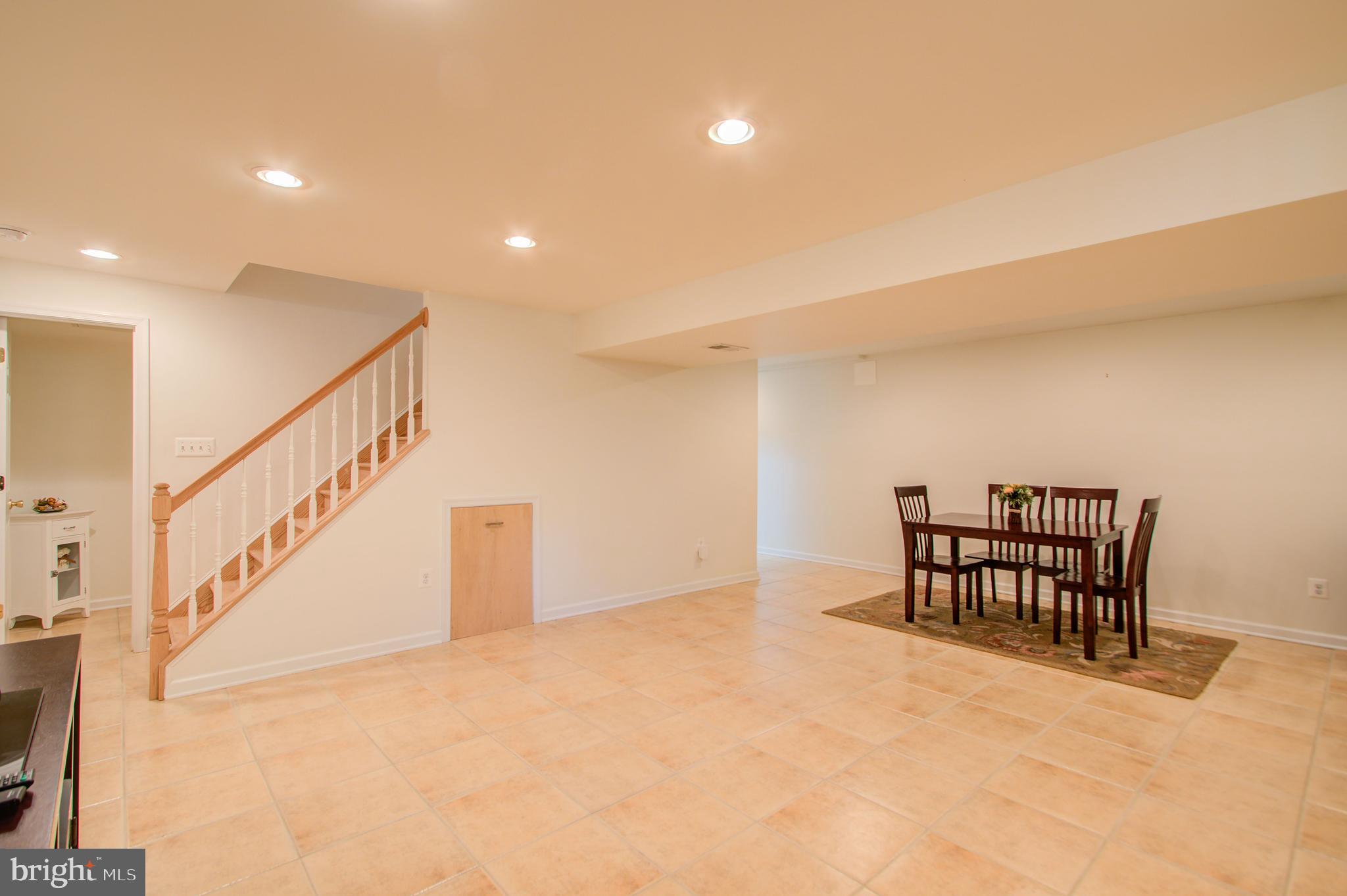1413 Rainbow Drive Silver Spring, MD 20905 - Photo 38 of 50 a view of furniture in room and stairs