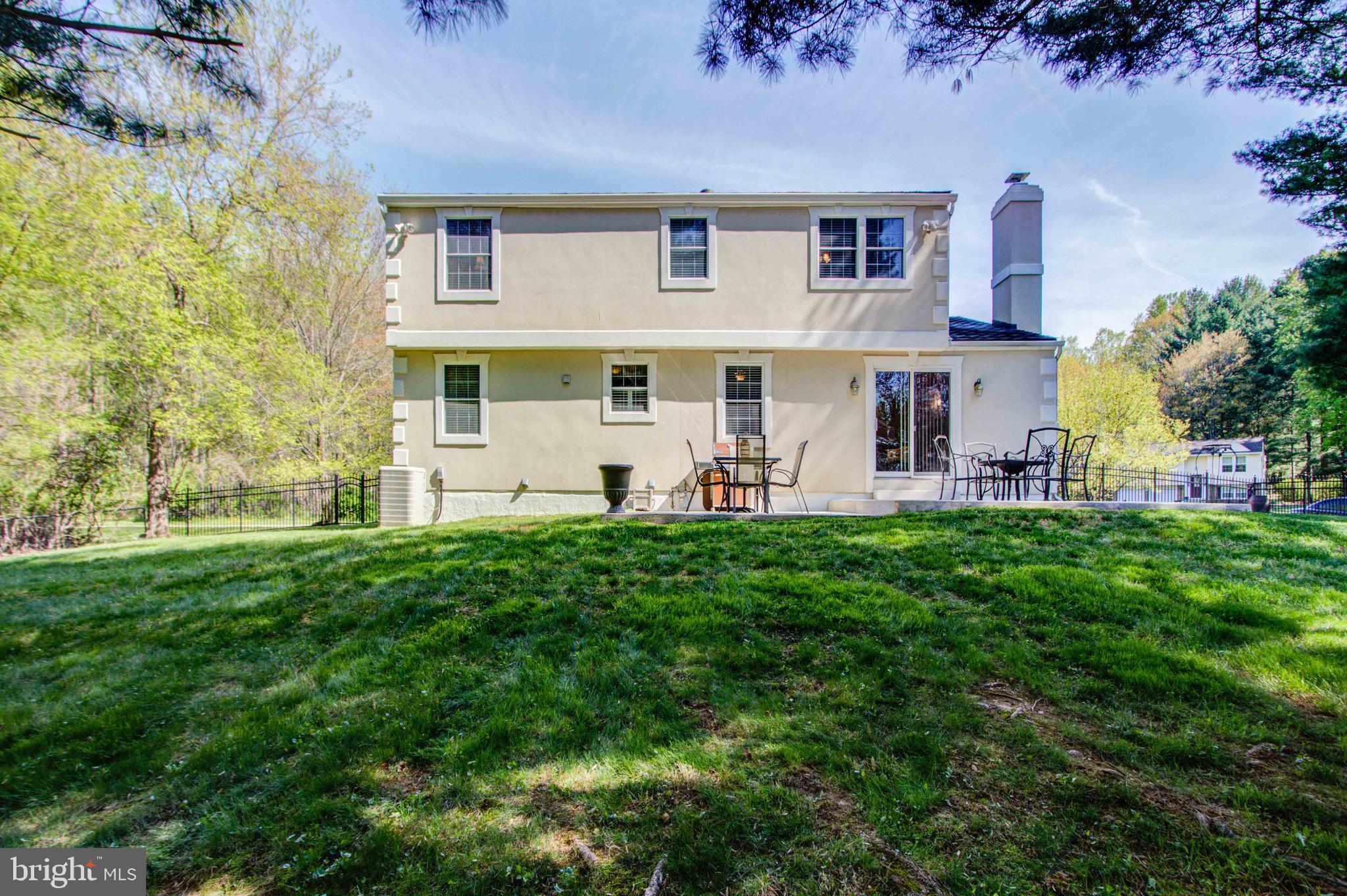 1413 Rainbow Drive Silver Spring, MD 20905 - Photo 45 of 50 a view of a front of a house with a yard
