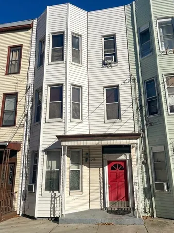 a building with red door