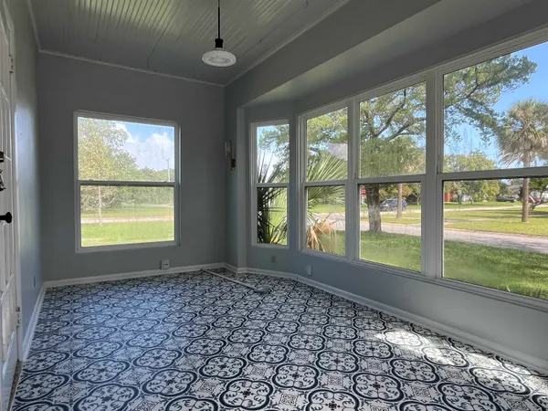 an empty room with windows