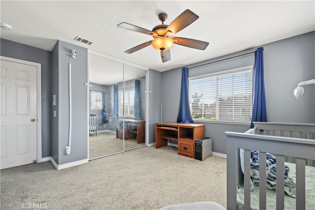 7219 Birch Tree Place Fontana, CA 92336 - Photo 30 of 49 a view of workspace with furniture and window