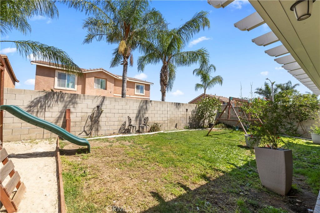 7219 Birch Tree Place Fontana, CA 92336 - Photo 46 of 49 a house that has a tree in it