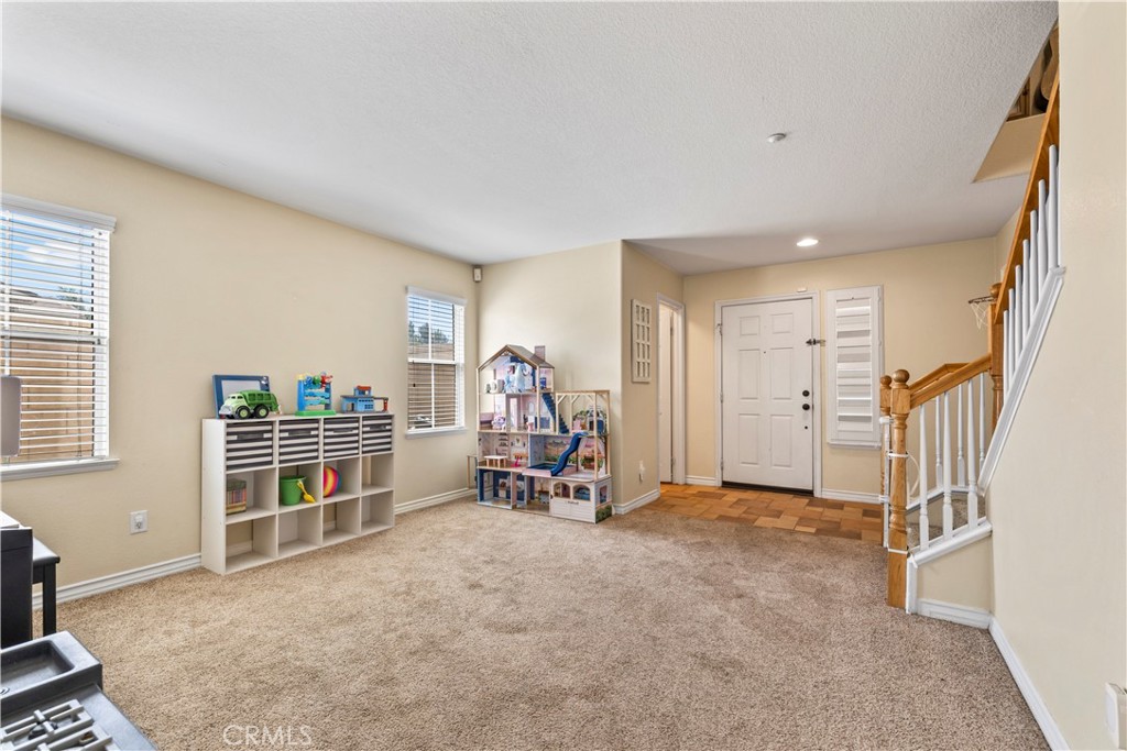 7219 Birch Tree Place Fontana, CA 92336 - Photo 8 of 49 a view of a livingroom with furniture and a window
