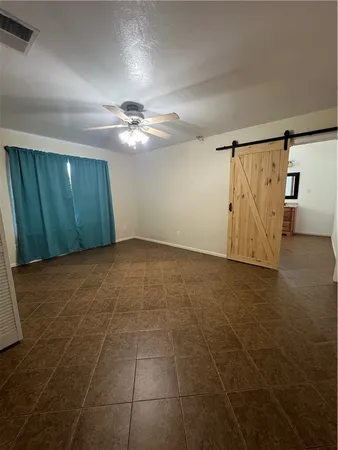 a bathroom with a tub sink toilet and mirror