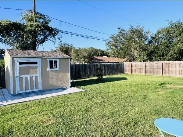a view of a lake with a floor to ceiling window and a floor to ceiling window
