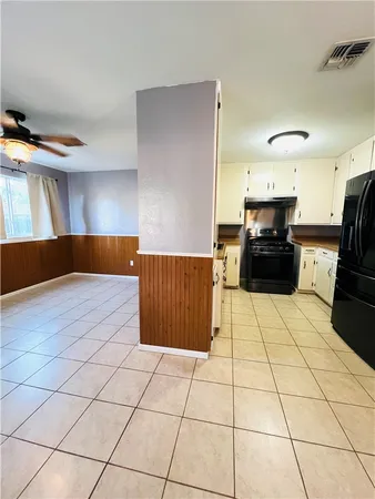 a view of a kitchen with a sink