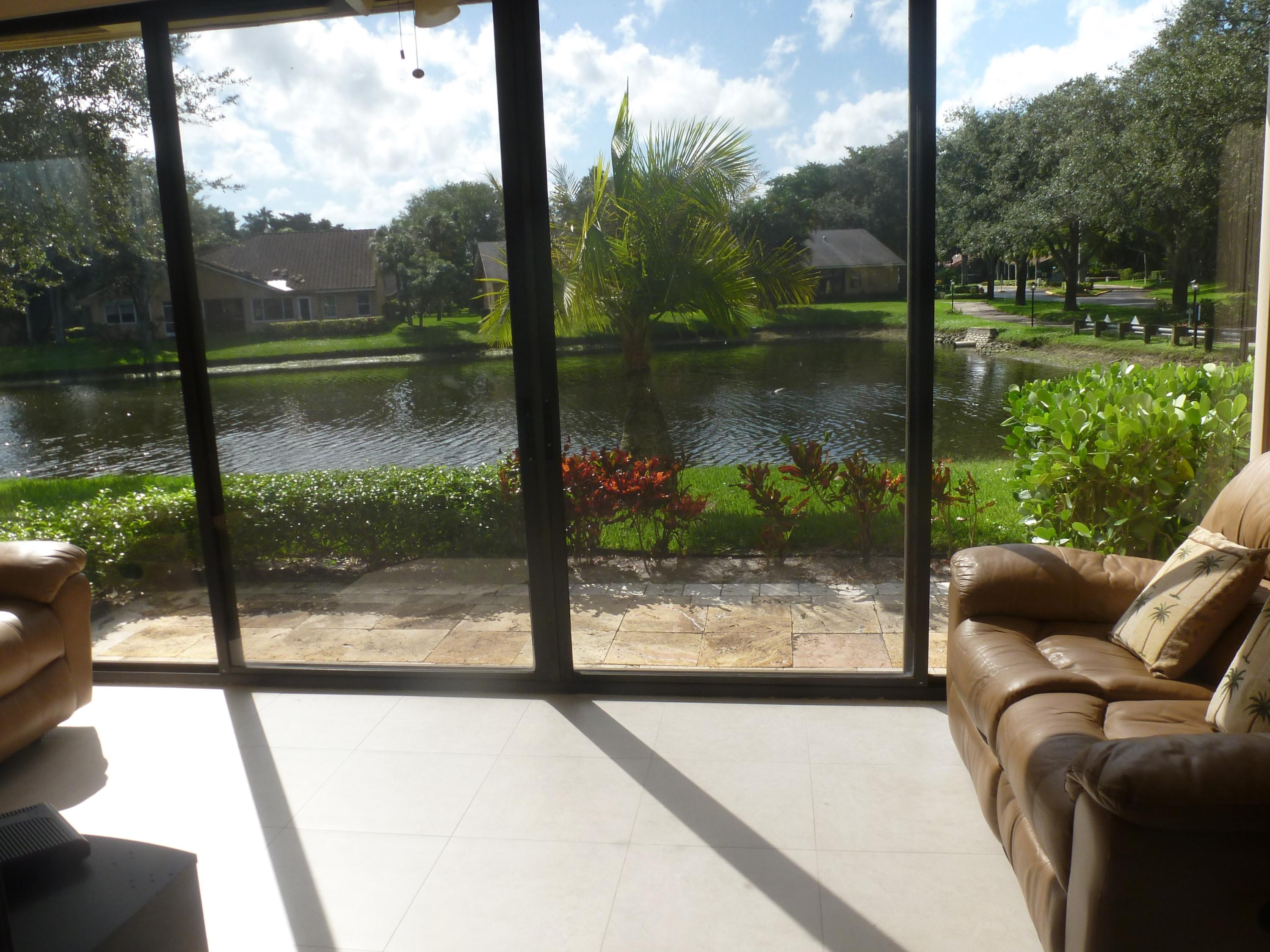 10926 Lake Front Place Boca Raton, FL 33498 - Photo 5 of 33 SUN ROOM LAKE VIEW