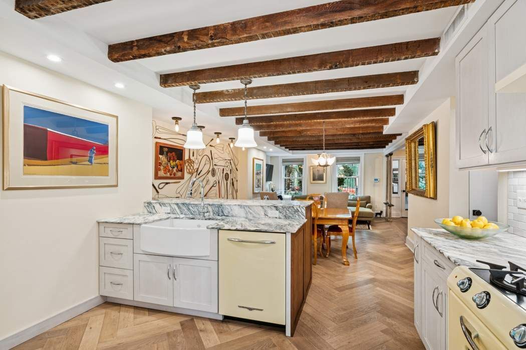 361 Dean Street Brooklyn, NY 11217 - Photo 4 of 18 a living room with stainless steel appliances granite countertop furniture and a kitchen view