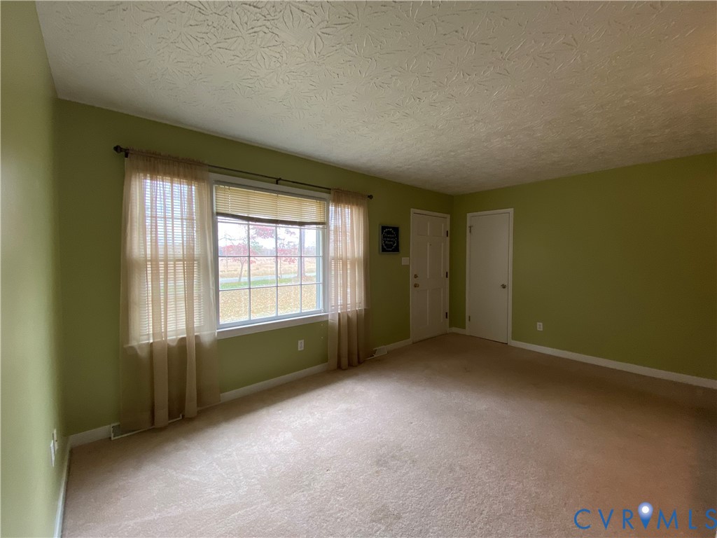 3766 Venter Road Richmond, VA 23227 - Photo 19 of 50 an empty room with a window