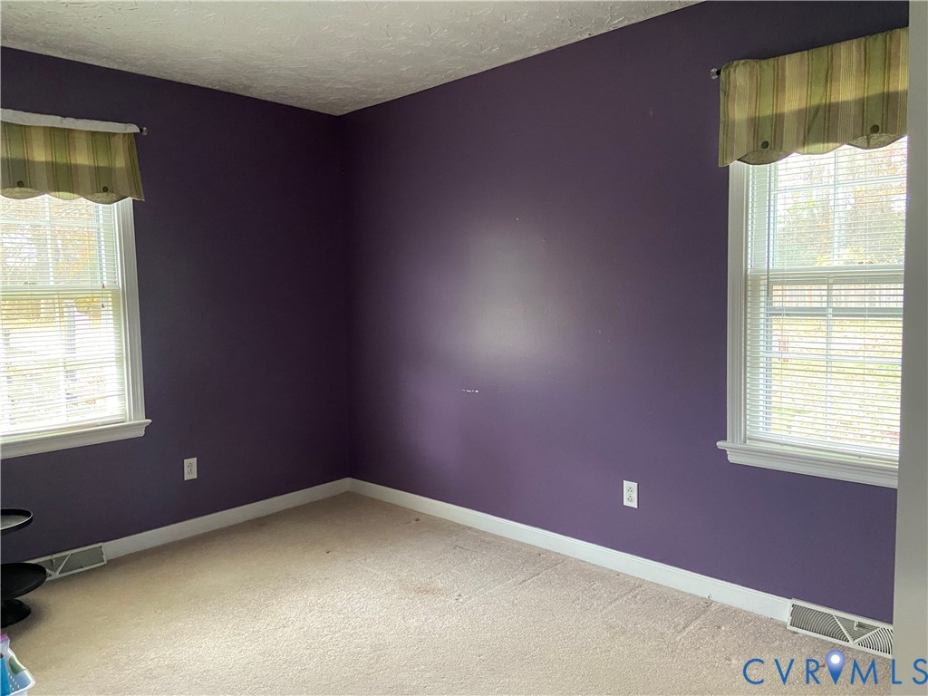 3766 Venter Road Richmond, VA 23227 - Photo 20 of 50 an empty room with a window