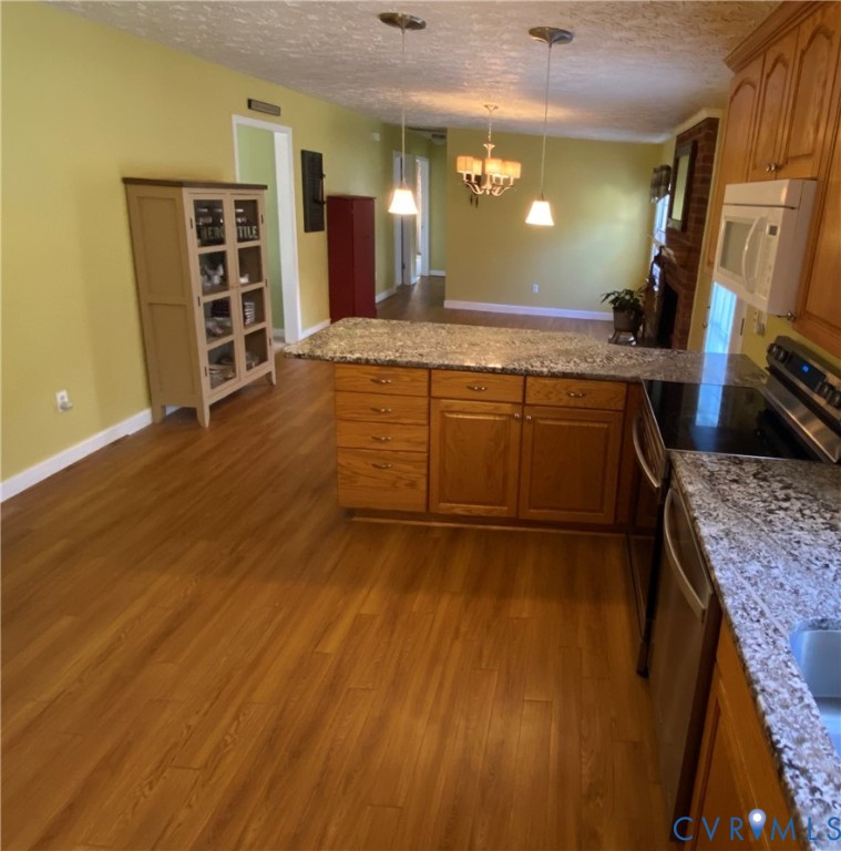 3766 Venter Road Richmond, VA 23227 - Photo 44 of 50 a view of a kitchen with cabinets and wooden floor