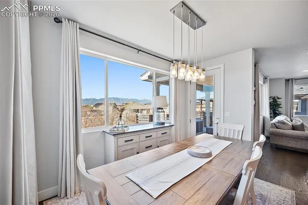 a view of staircase with white walls and railing