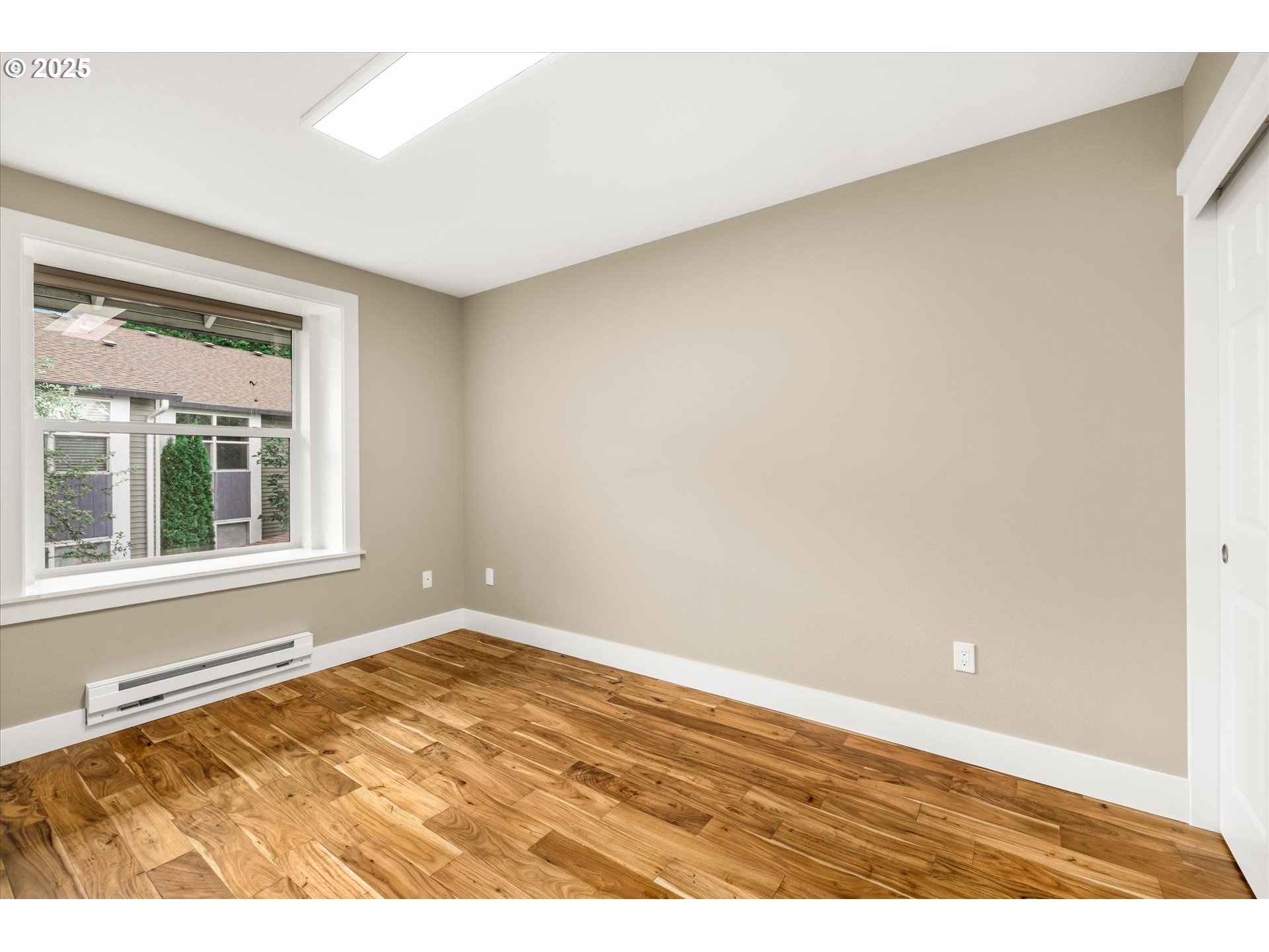 4686 West Powell Boulevard, Unit 241 Gresham, OR 97030 - Photo 30 of 44 a view of an empty room with a window