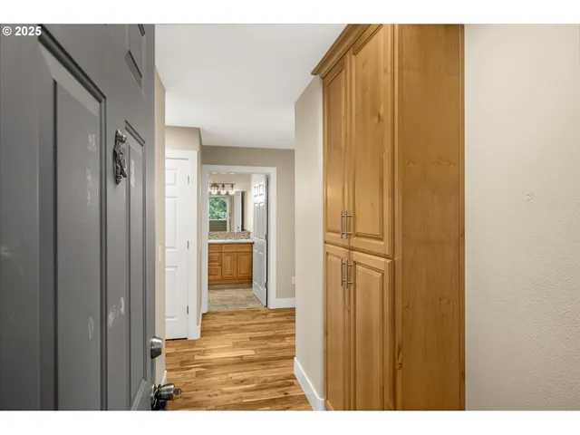 a view of a bathroom from the hallway