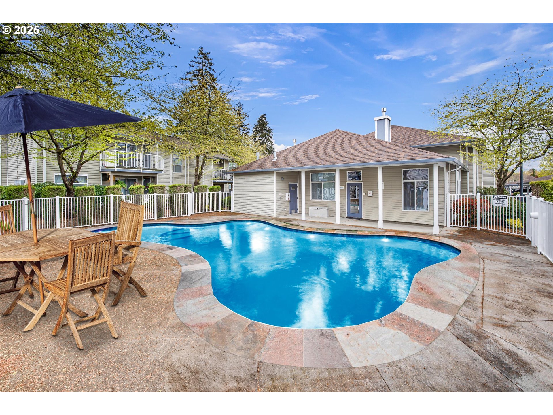 4686 West Powell Boulevard, Unit 241 Gresham, OR 97030 - Photo 32 of 44 a view of a house with pool
