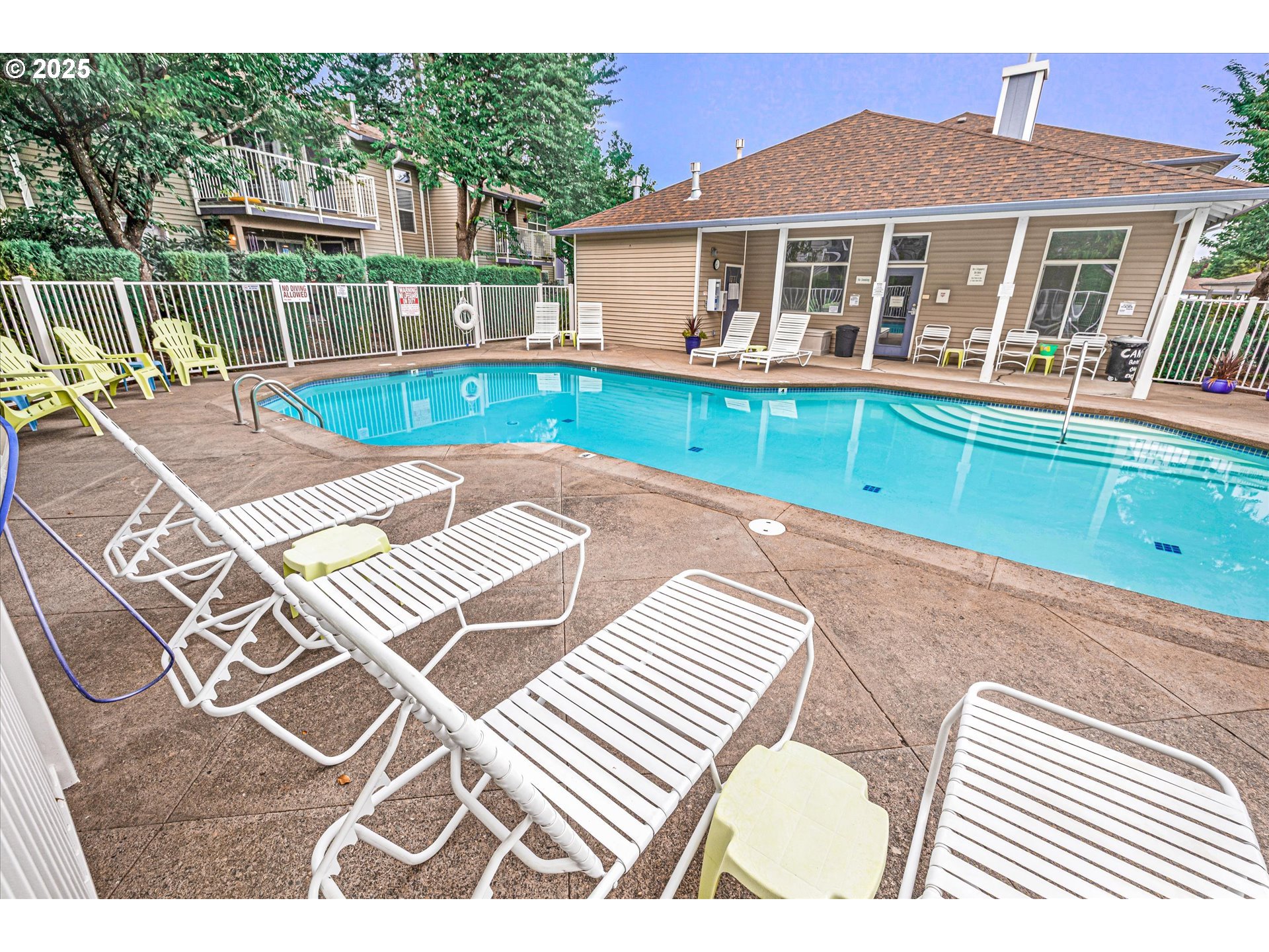 4686 West Powell Boulevard, Unit 241 Gresham, OR 97030 - Photo 35 of 44 front view of a house with a patio