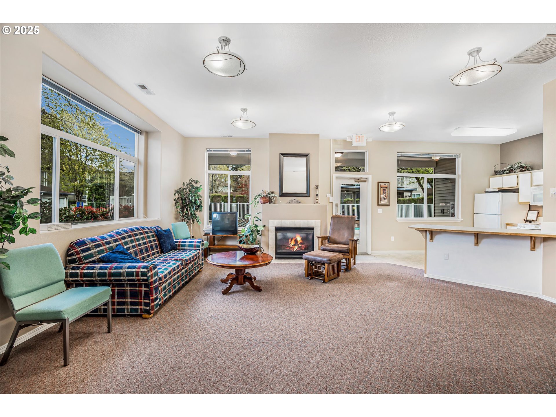 4686 West Powell Boulevard, Unit 241 Gresham, OR 97030 - Photo 38 of 44 a living room with furniture and a fireplace
