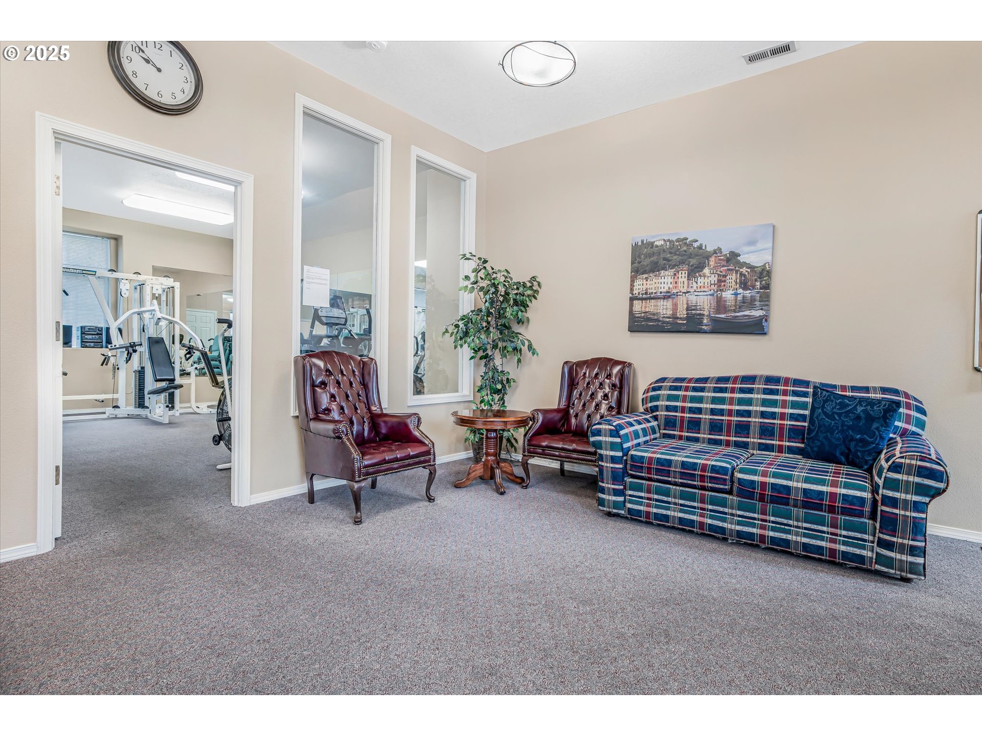4686 West Powell Boulevard, Unit 241 Gresham, OR 97030 - Photo 39 of 44 a living room with furniture and a chair
