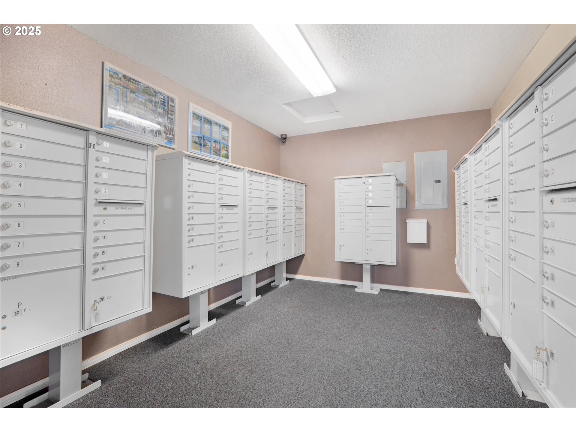 4686 West Powell Boulevard, Unit 241 Gresham, OR 97030 - Photo 42 of 44 a view of an empty room with cabinet and stairs